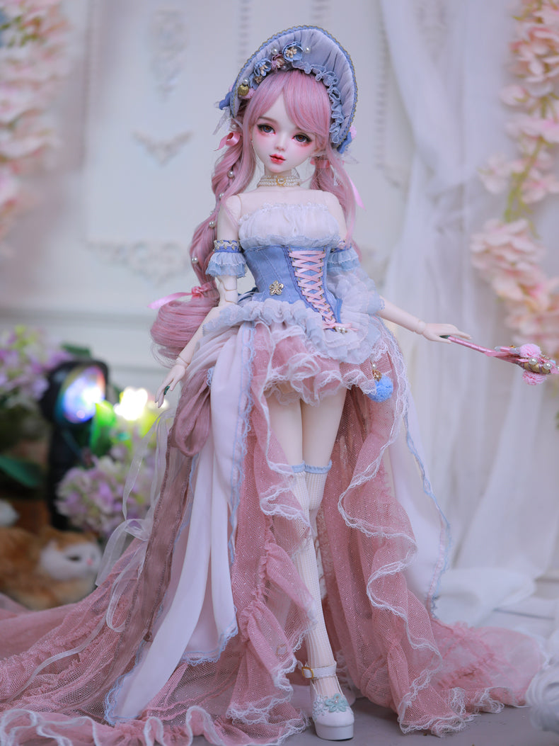 Carla Doll by Sukuroi in a pink and blue dress with lace details, standing gracefully