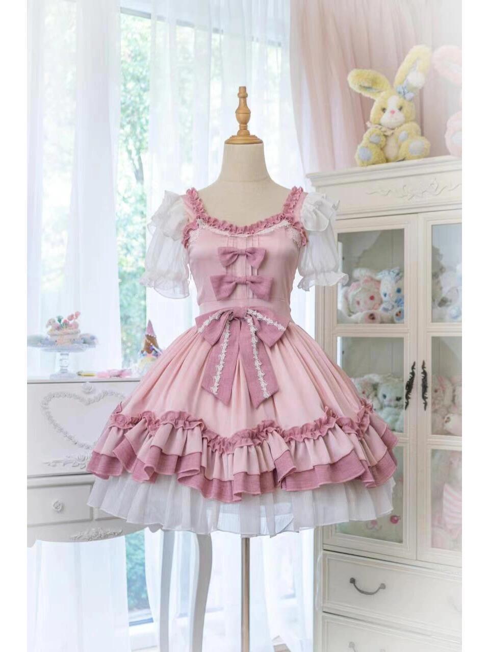 Front View of Pink Lolita Dress with bows and ruffled details