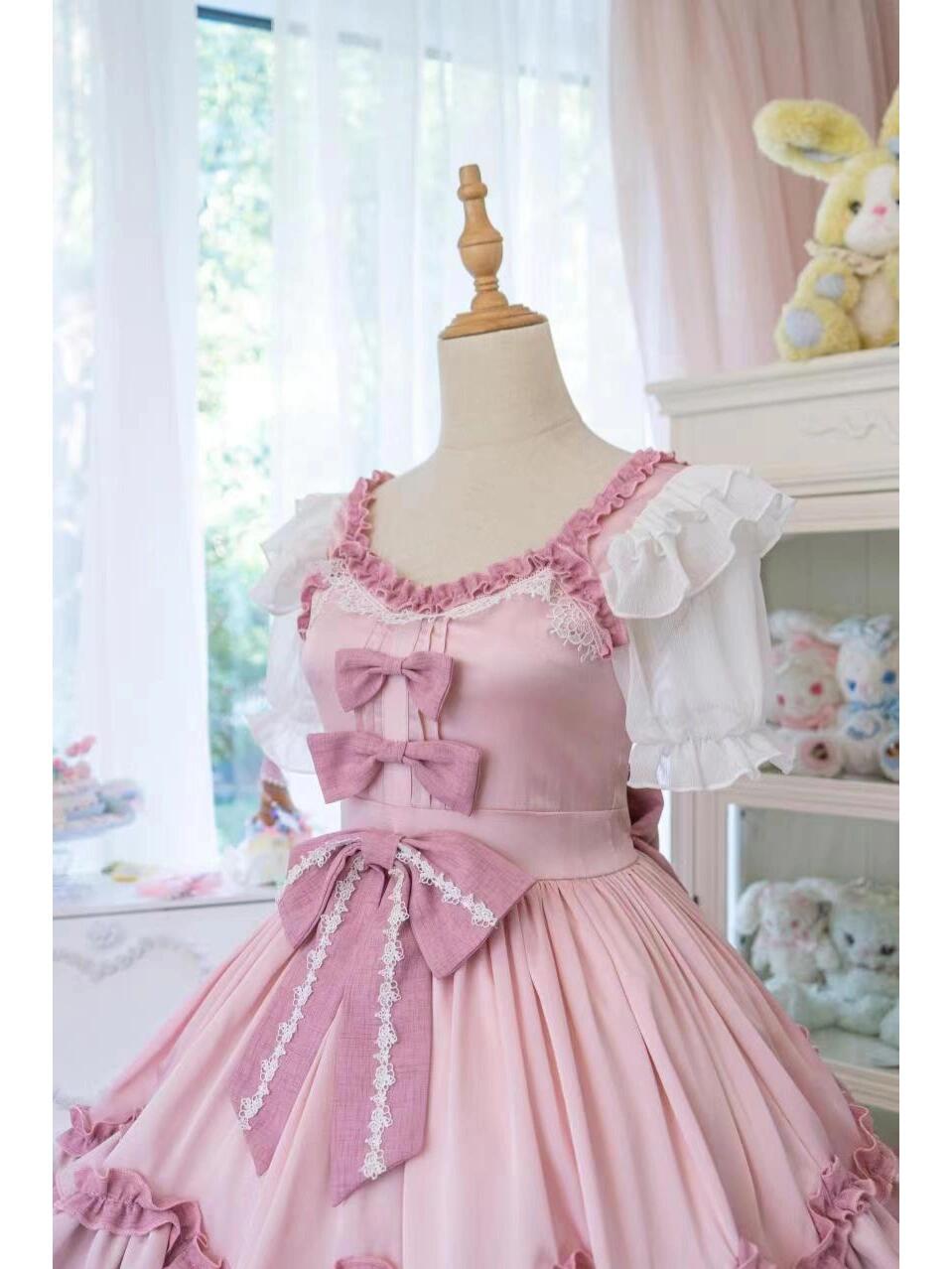 Right side view of Pink Lolita Dress with delicate bows and lace details