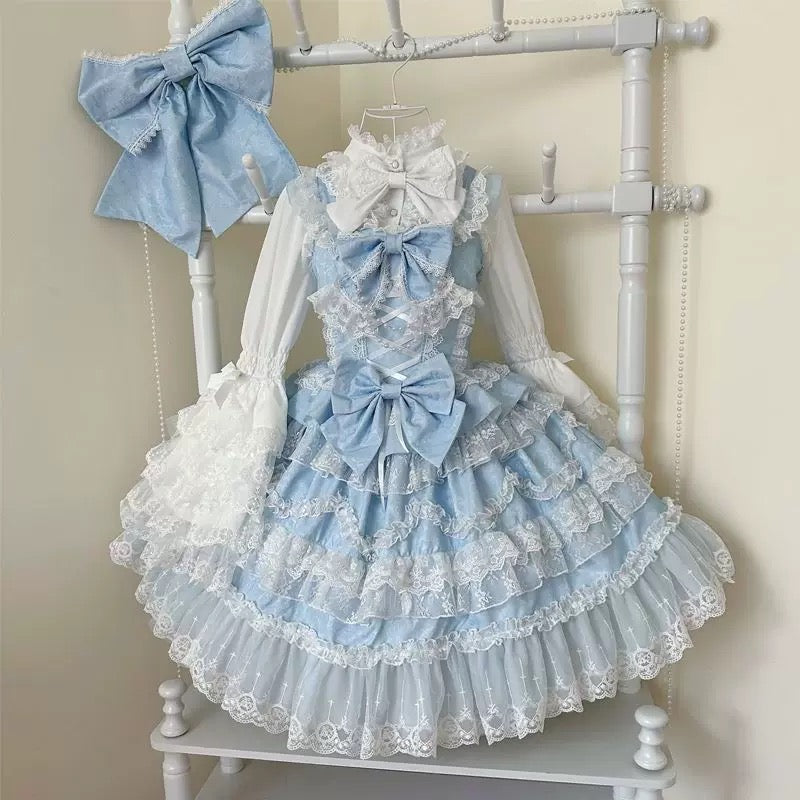 Blue ruffle dress with bows