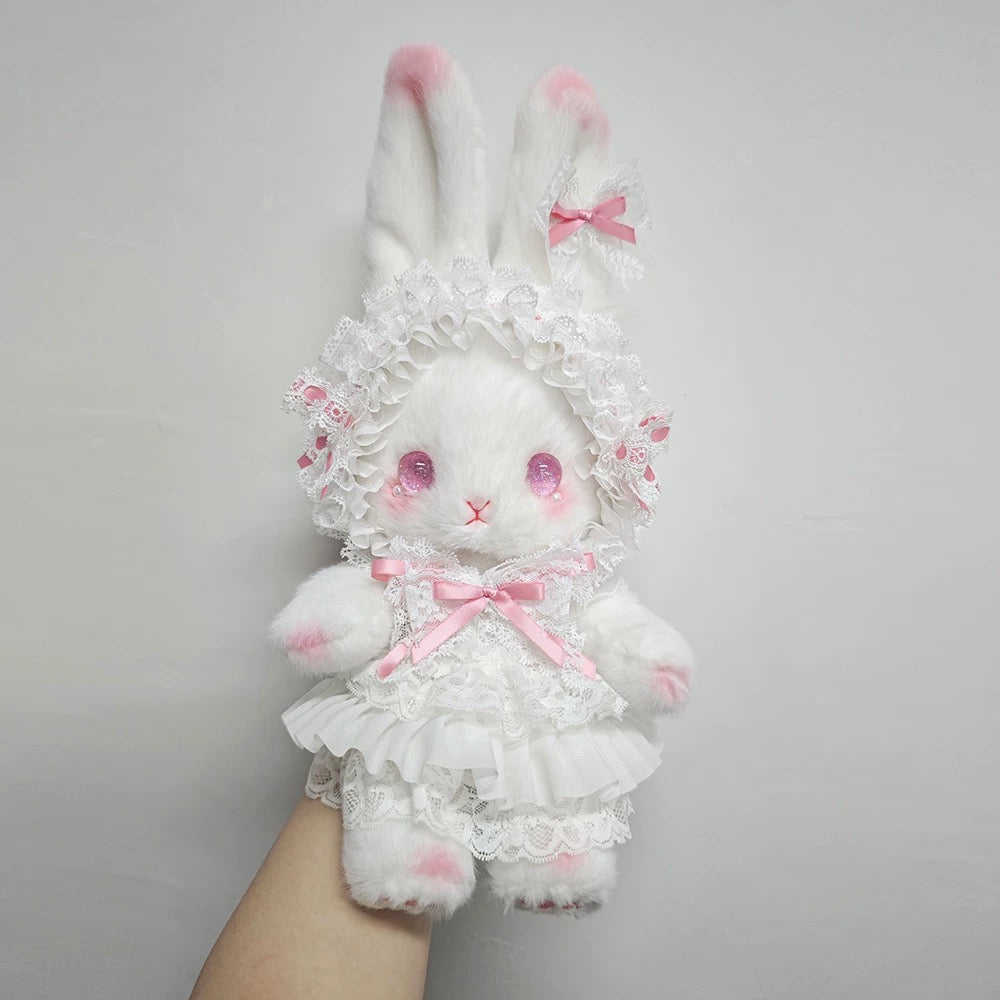 Soft pink plush bunny bag with elegant lace design