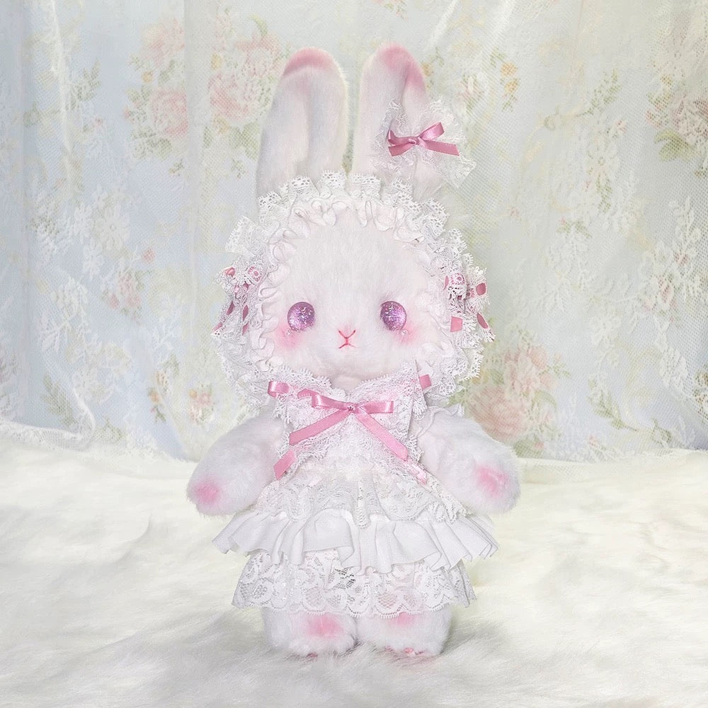 Whimsical pink plush bunny bag with a lace trim dress