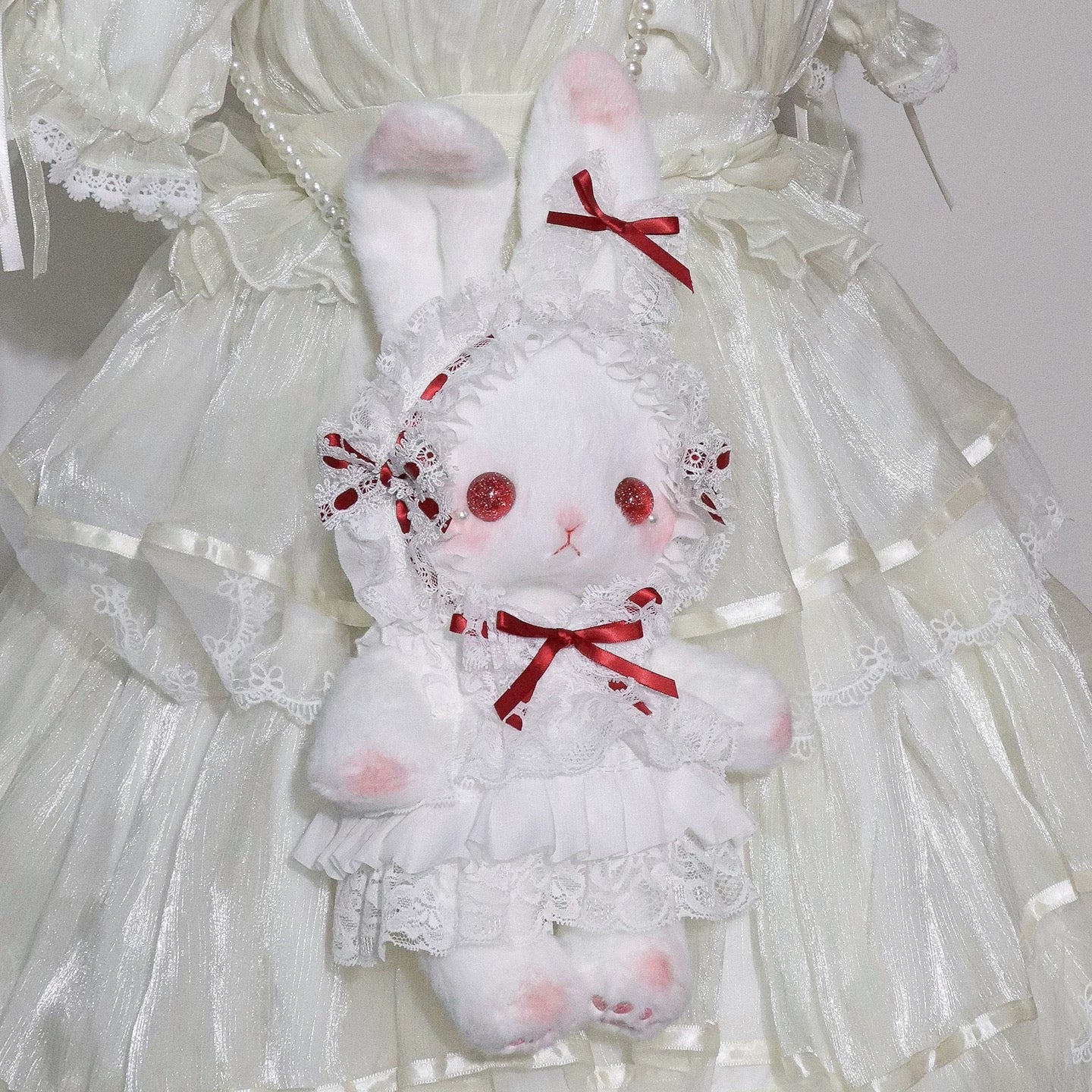 Bunny Lace Lolita Bag with lace trims and a red ribbon bow