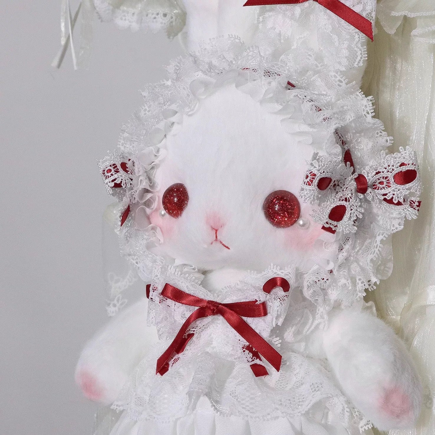 Close-up of the red ribbon detail on the Bunny Lace Lolita Bag