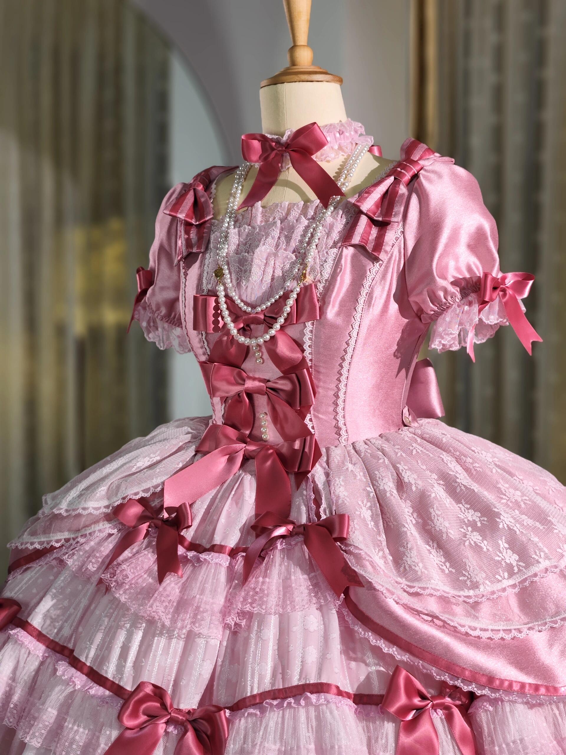 Lolita dress in pink and fuchsia tones