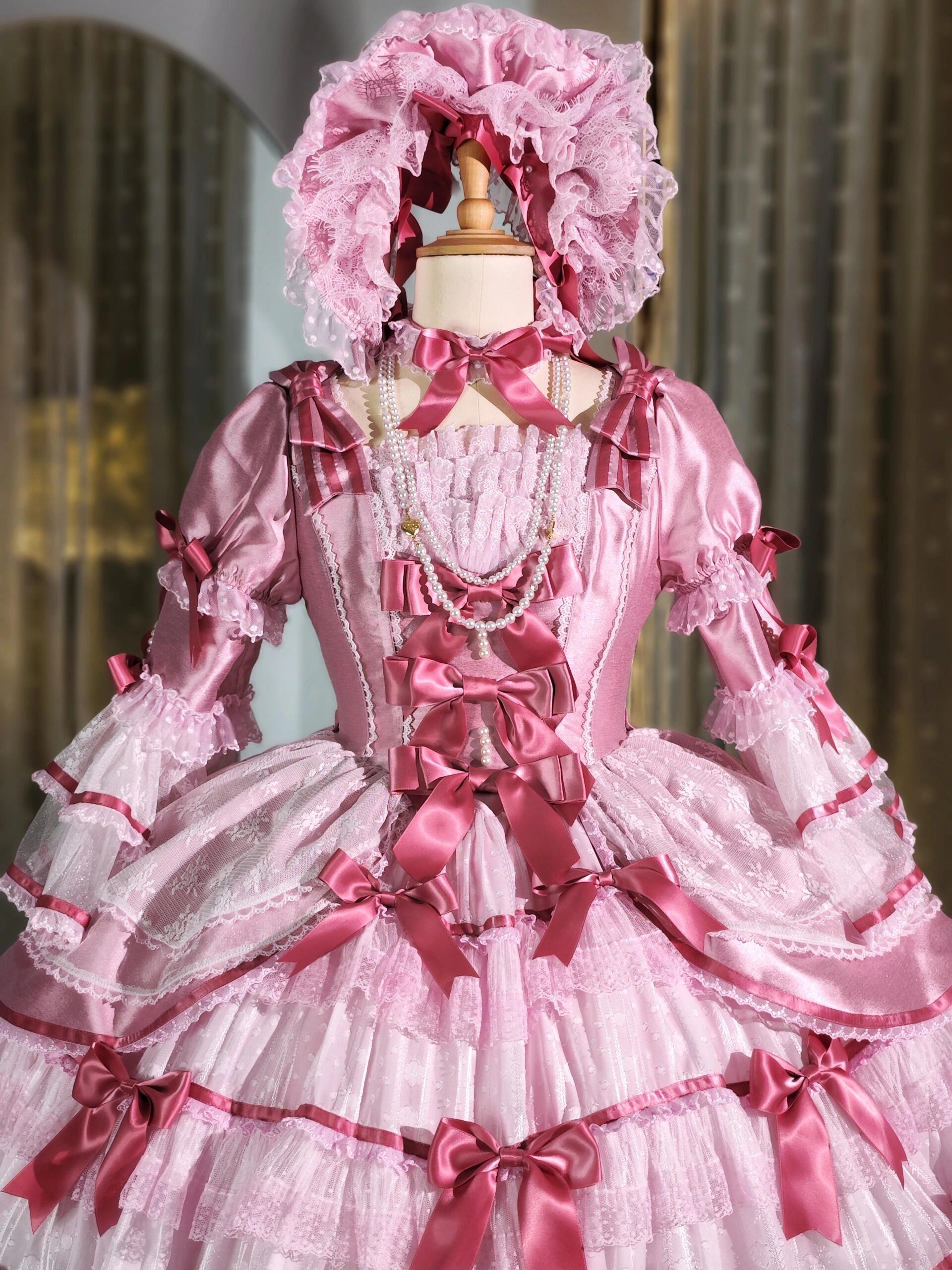 Full outfit of pink Lolita dress and bonnet