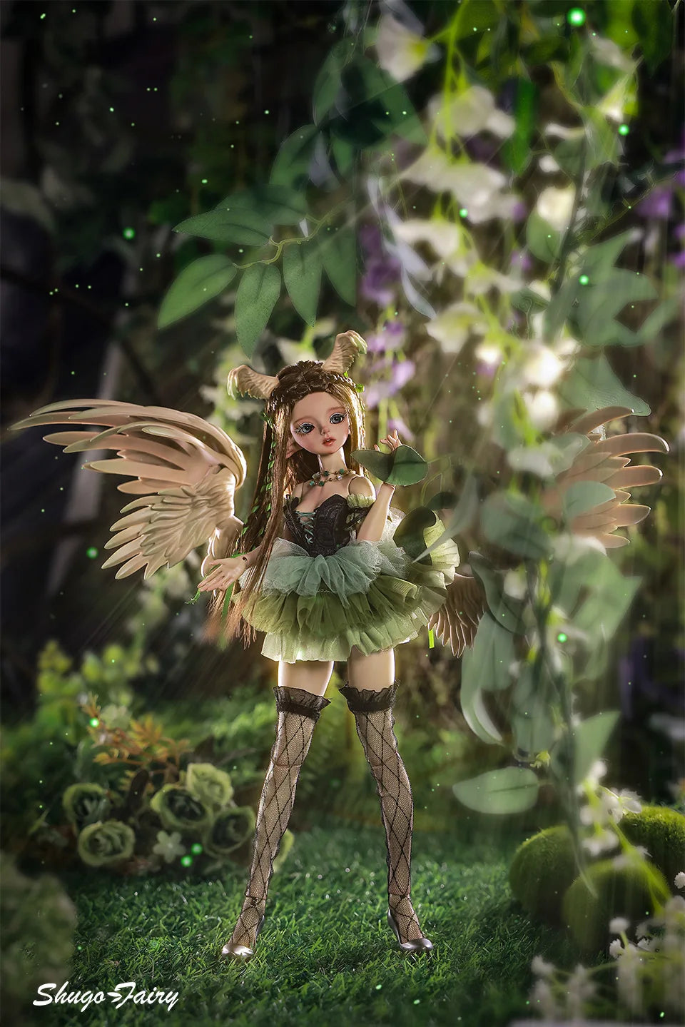 ShugaFairy Pegasus doll posing in a vibrant forest with angel wings and a green tulle dress, surrounded by foliage