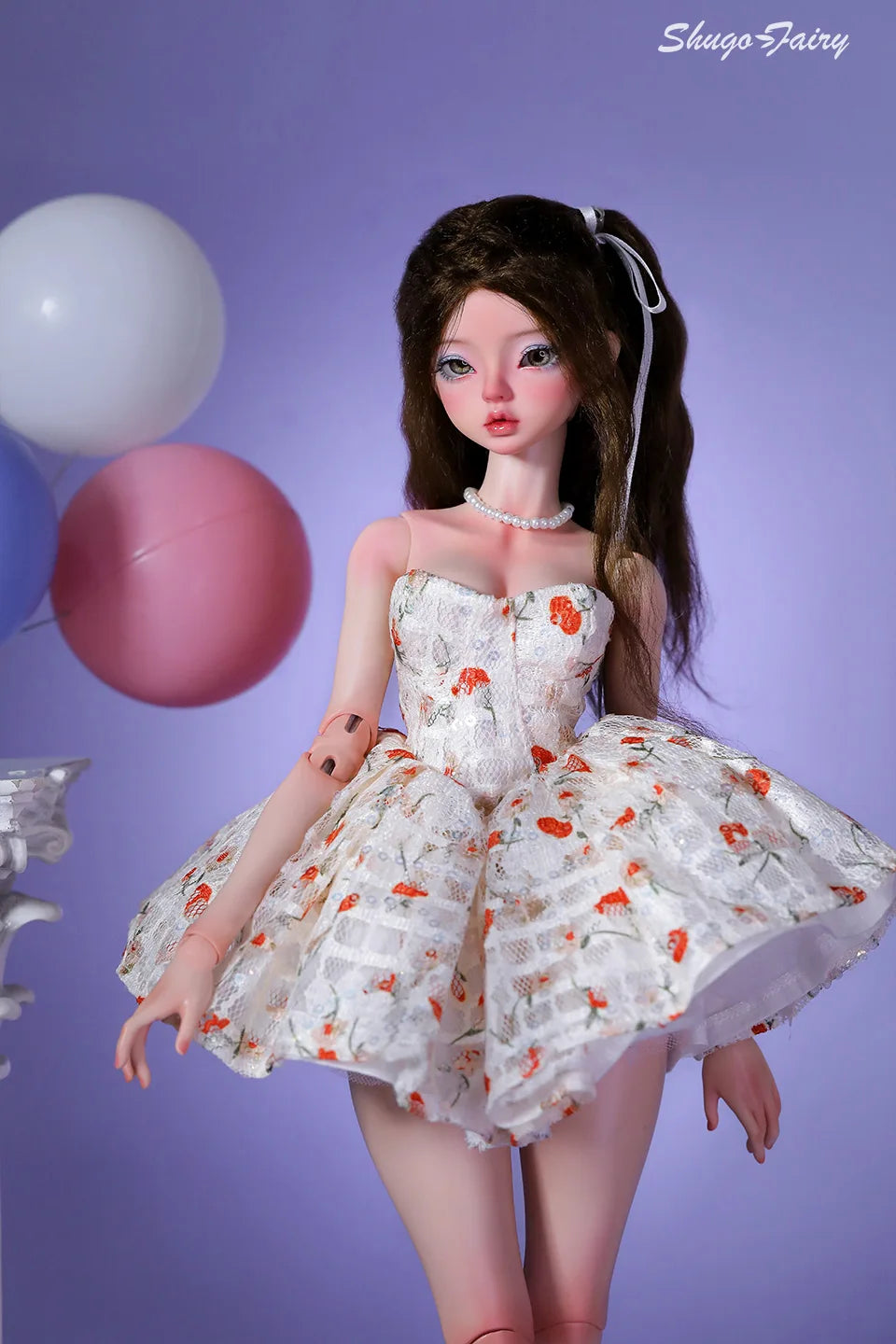 Elegant BJD doll in a white Doll Floral Dress featuring orange flowers