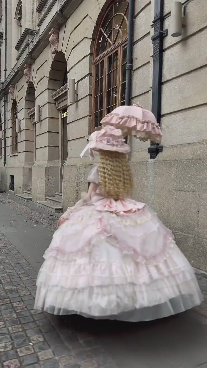 Back view of pink Lolita dress with parasol