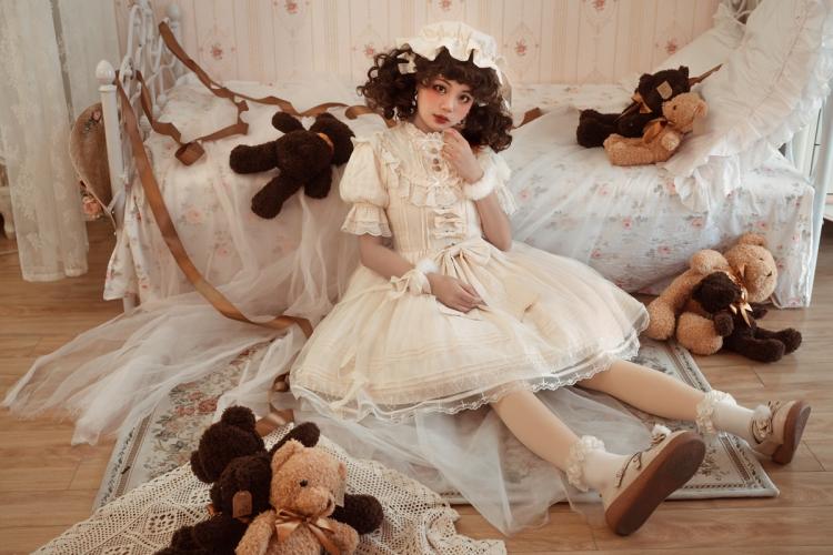 Lolita Fashion dress with cream and lace, styled with teddy bears, an enchanting piece from Sukuroi