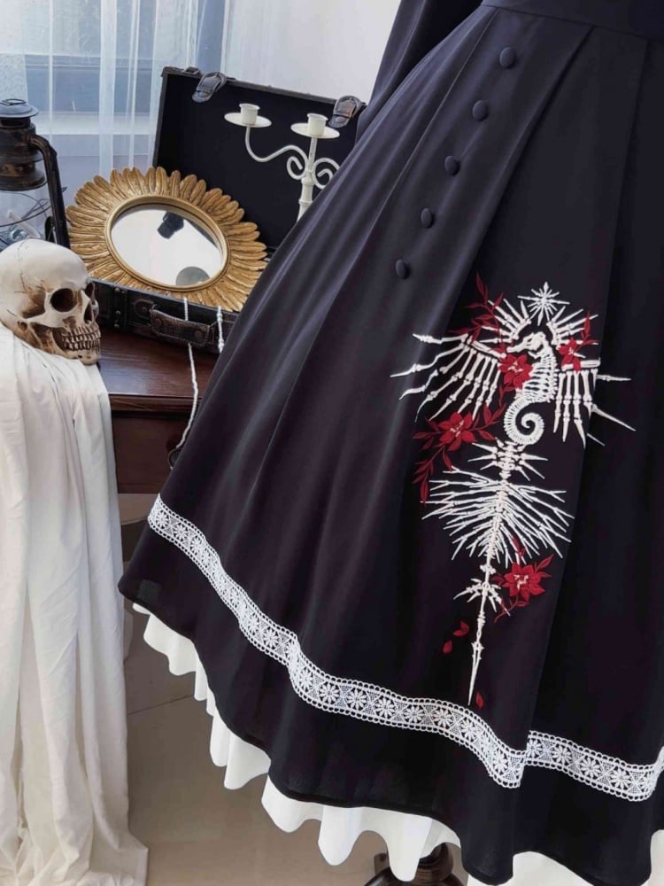 Close-up of Gothic Skeleton Dress with floral embroidery
