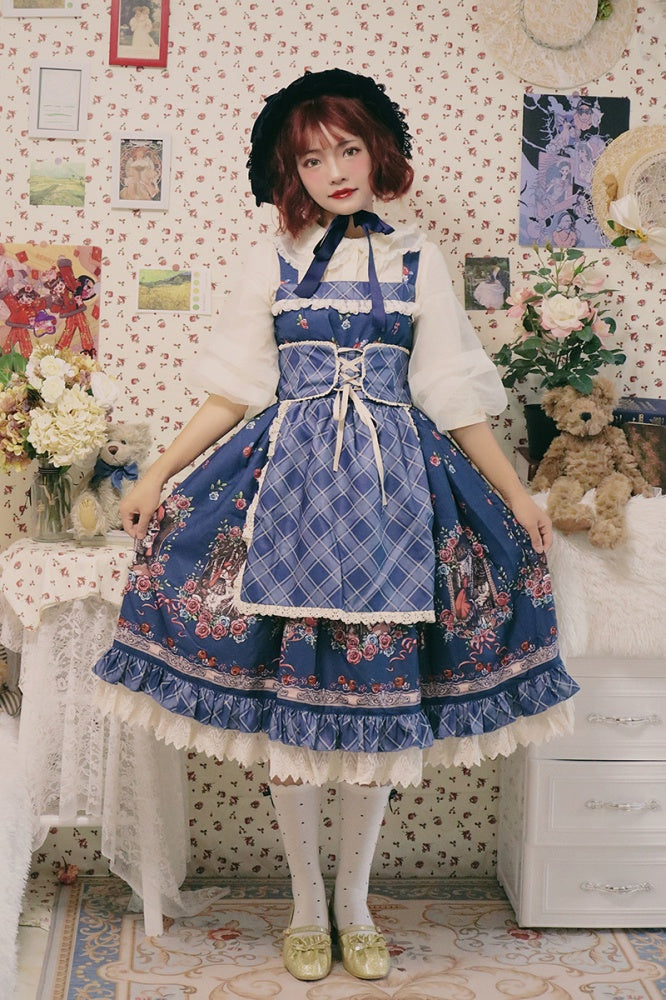 Model posing indoors wearing blue Little Red Riding Hood jumper skirt with white blouse