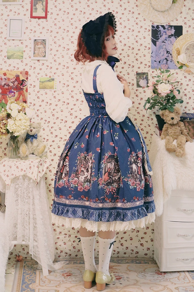 Back view of a blue Little Red Riding Hood jumper skirt with storybook print and lace trim