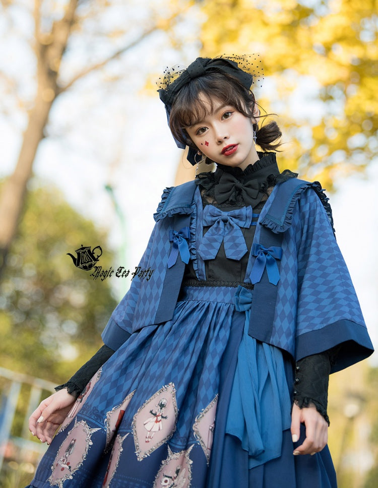 No One Lives Jumper Skirt in blue with matching cape and bow accents