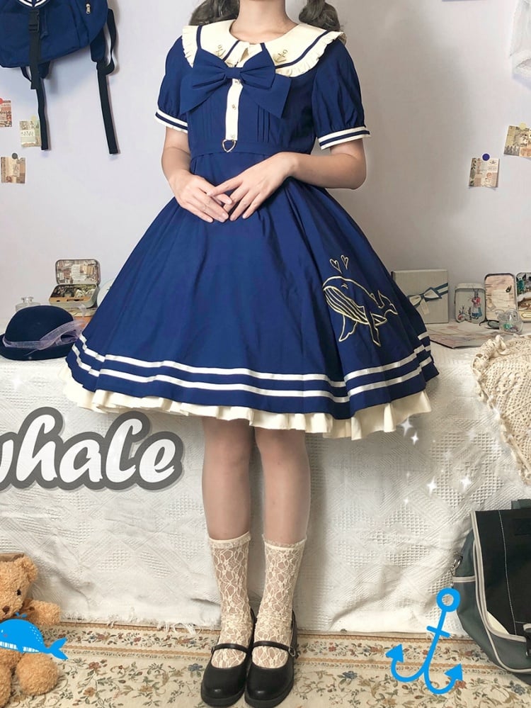Dark blue dress with whale embroidery and peter pan collar