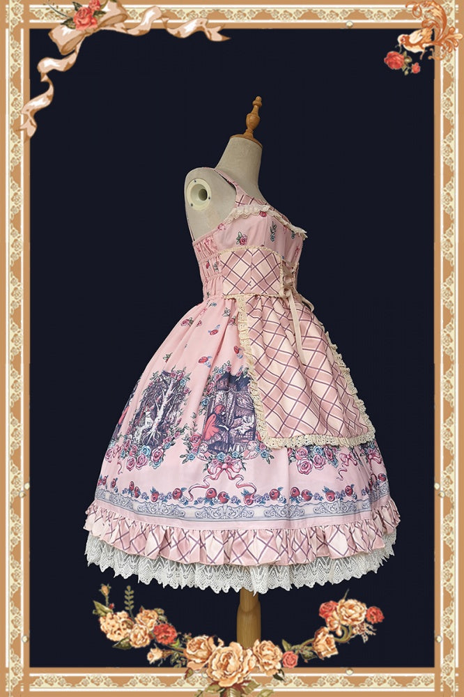 Side view of pink Little Red Riding Hood jumper skirt featuring storybook print