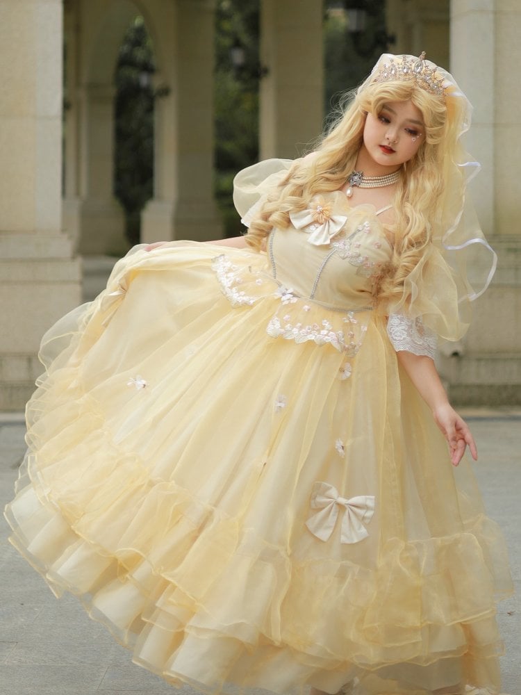 Golden floral princess dress with puff sleeves and tiara crown