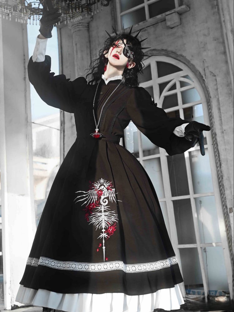 Model wearing black Gothic Skeleton Dress with floral embroidery