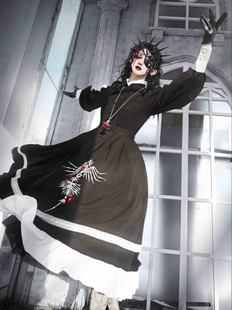 Model in black Gothic Skeleton Dress in a spinning pose