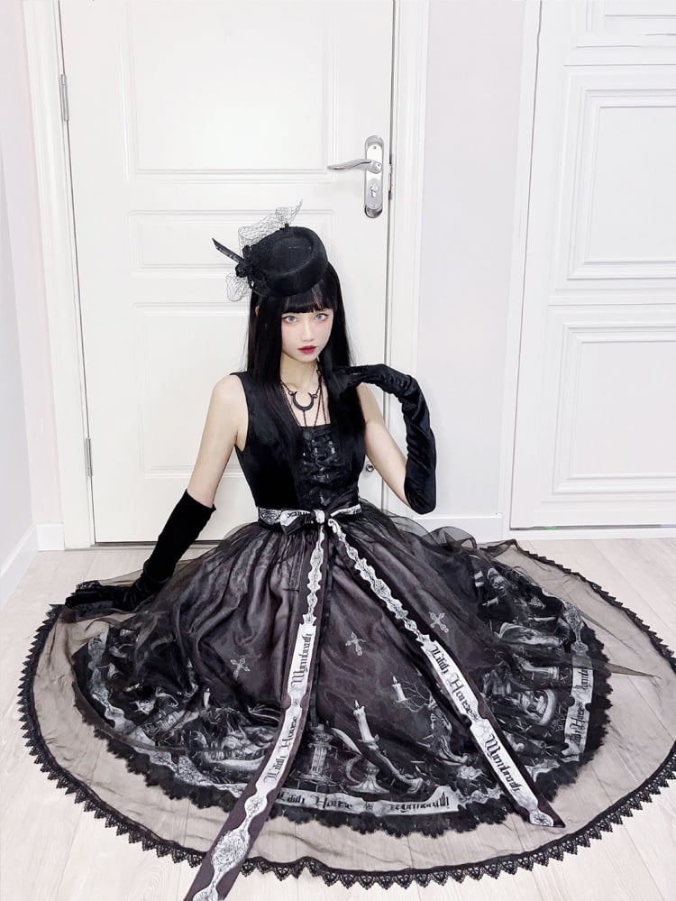 Women’s gothic fashion in black jumper skirt with dragon print