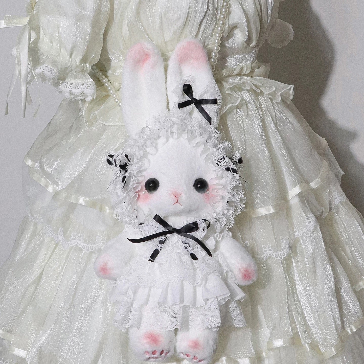 Soft and elegant Plush Bunny Bag with lace accents