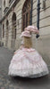Back view of pink Lolita dress with parasol