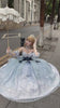 Woman in Celeste Waltz Dress