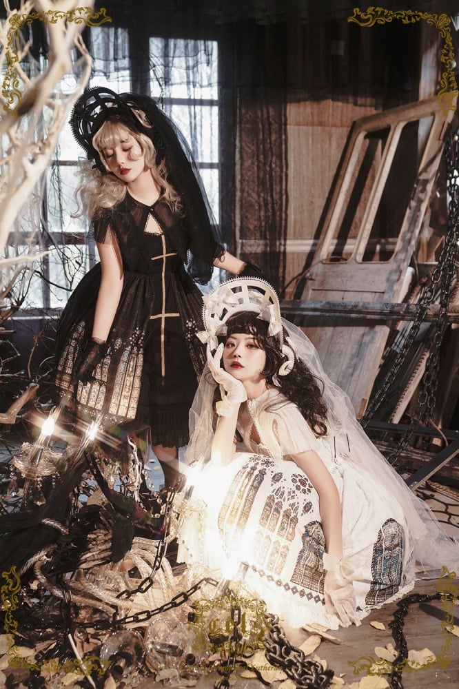 Two models in black and white dresses with stained glass elements