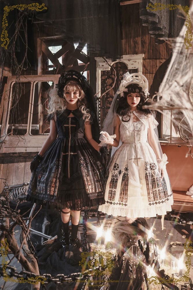 Two models in gothic attire with stained glass and lace detailing