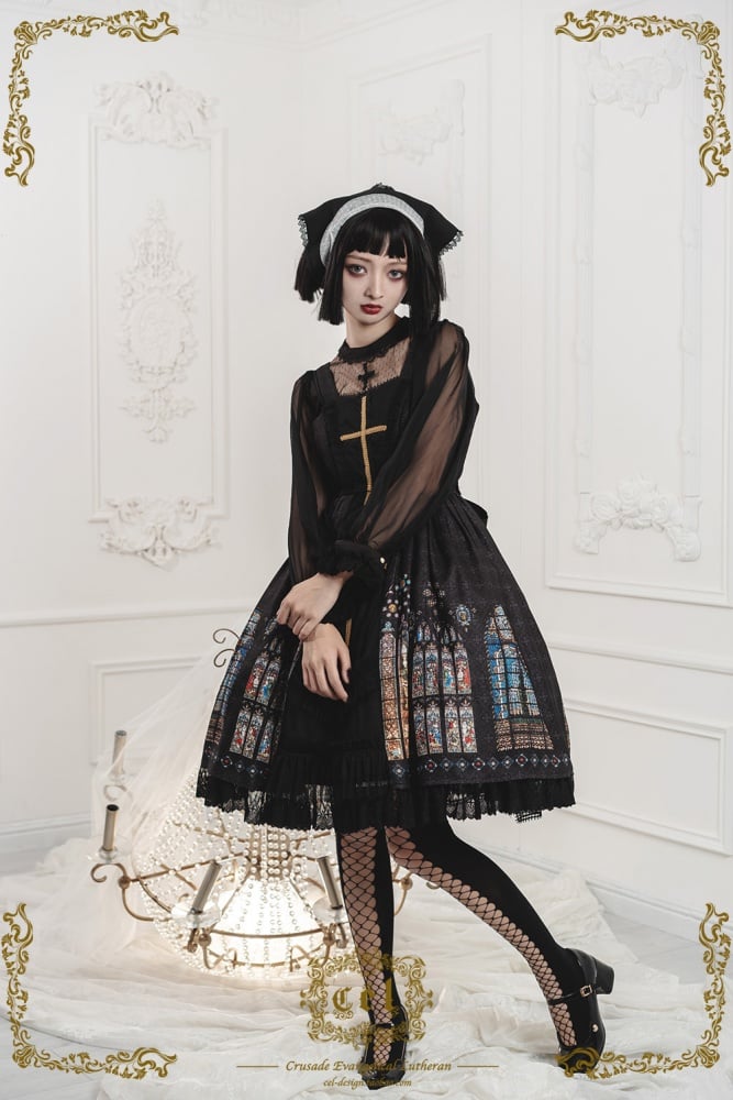 Elegant model posing in black gothic dress