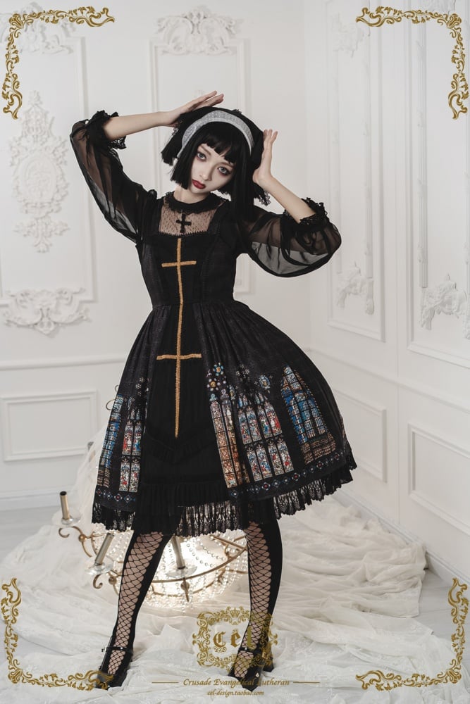 Model showcasing black gothic 
dress 