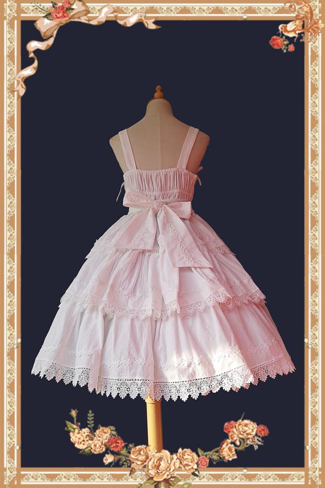 Back view of white Cake Tree Tiered Flounce Skirt featuring a large bow and lace trim