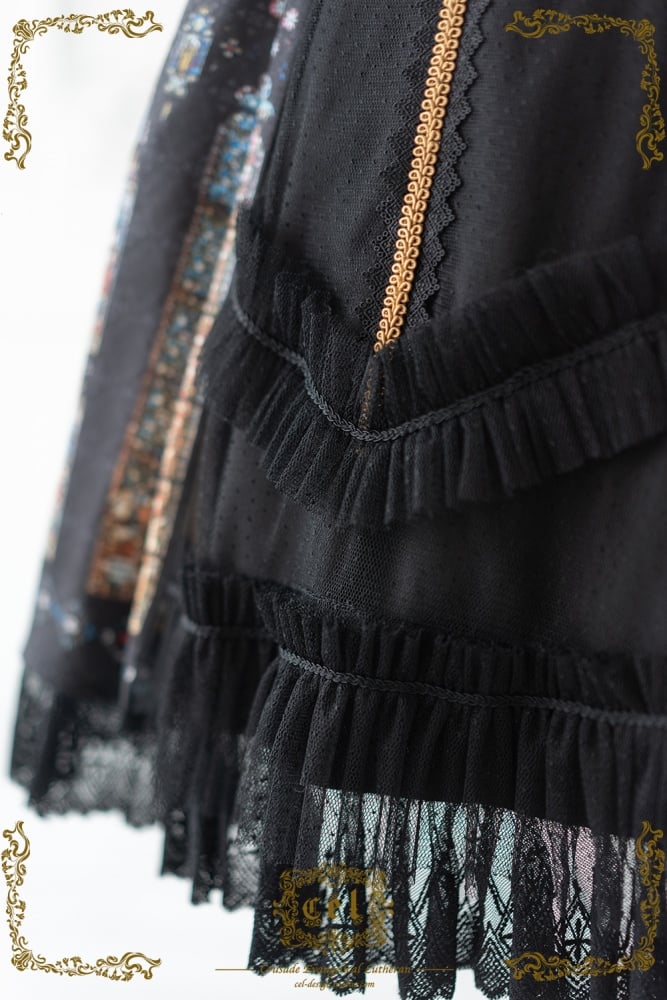 Close-up of black gothic dress with ruffled lace trim