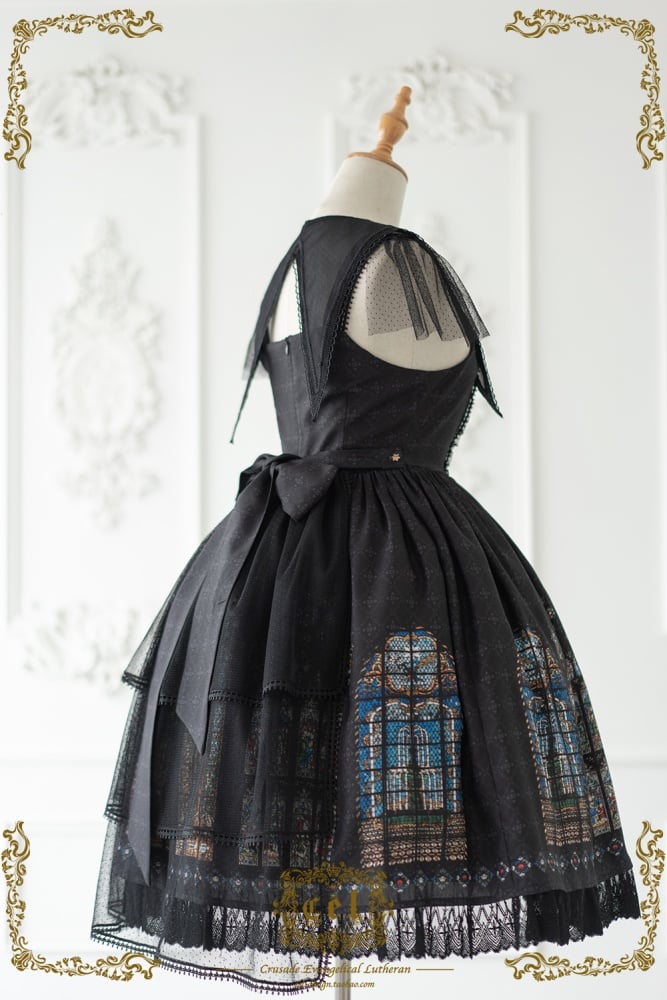 Side view of black gothic dress with stained glass design