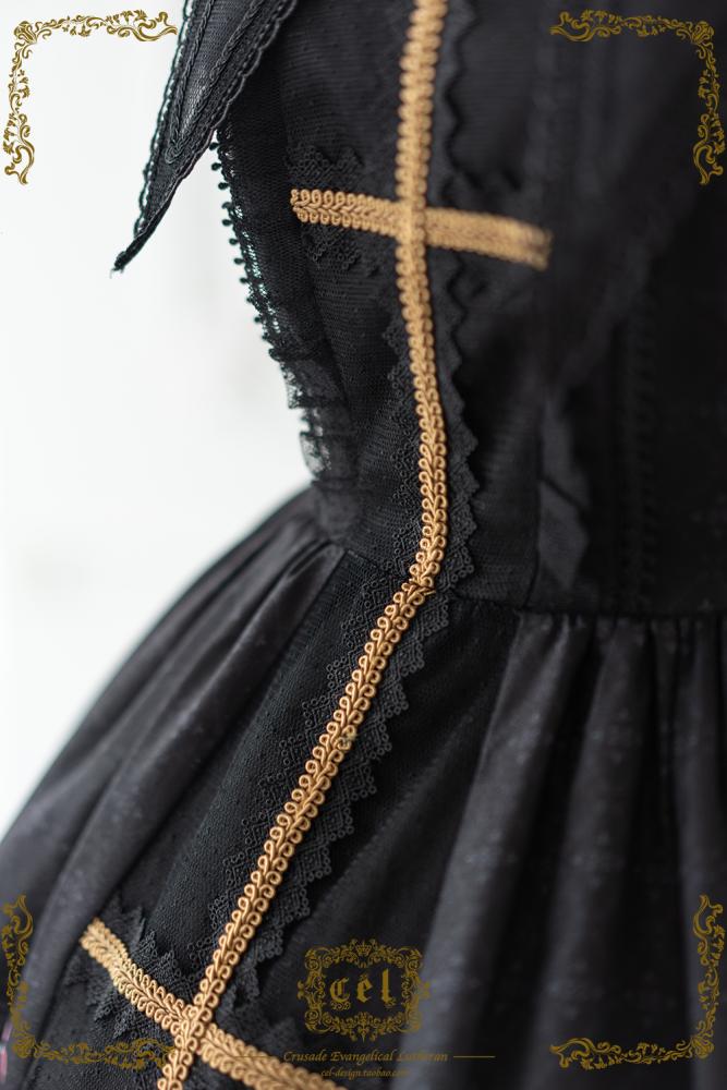 Gothic dress close-up highlighting the gold cross design
